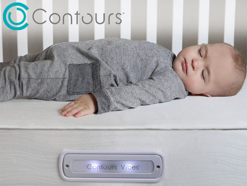 close-up of a baby sleeping on a contours vibes crib mattress