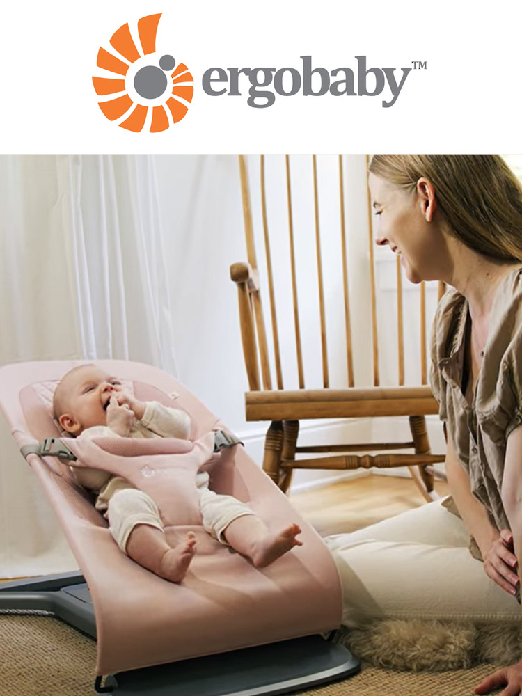 a pink ergobaby evolve bouncer seat with a smiling baby and an onlooking mother