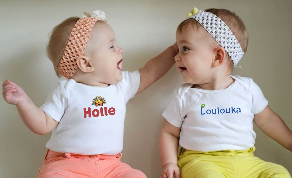 two babies one wearing a holle shirt and the other wearing a loulouka baby formula comparison