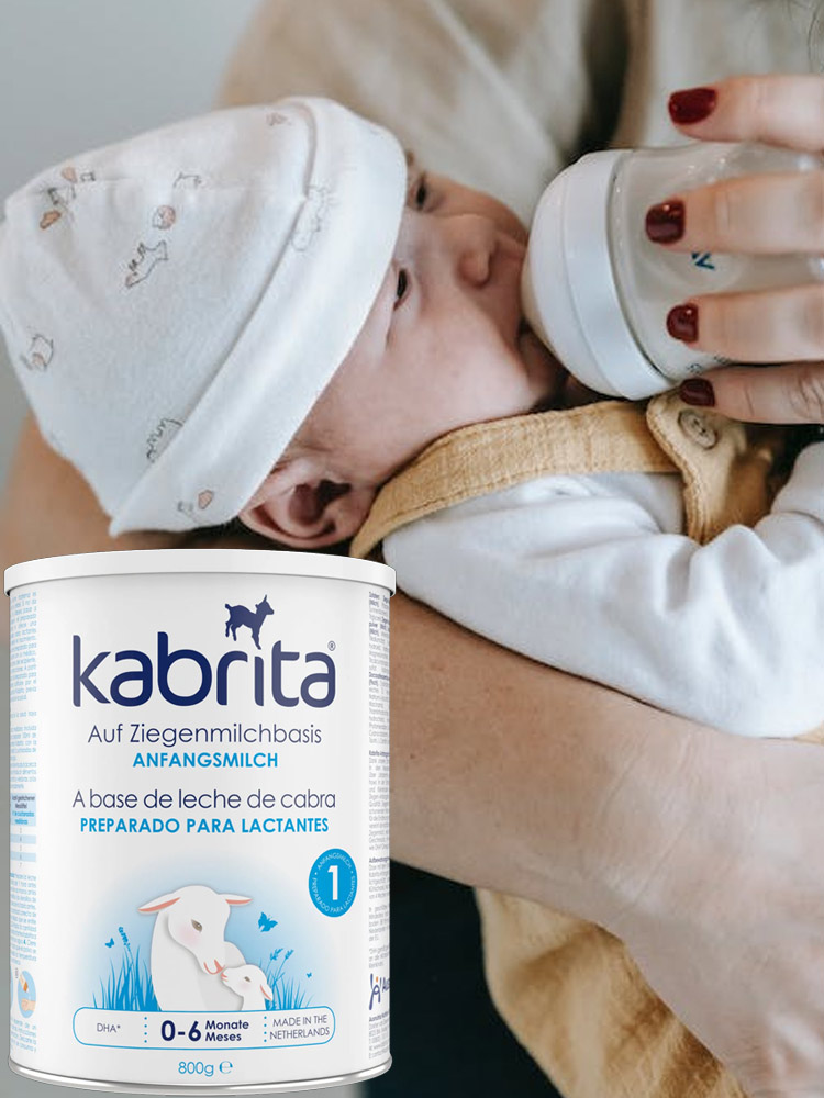 baby being fed kabrita goat infant formula from a bottle