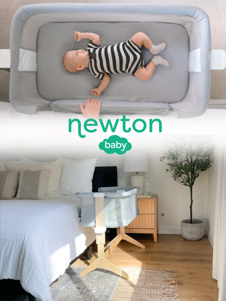 top view of baby sleeping in the newton bassinet and the bedside sleeper positioned next to the bed