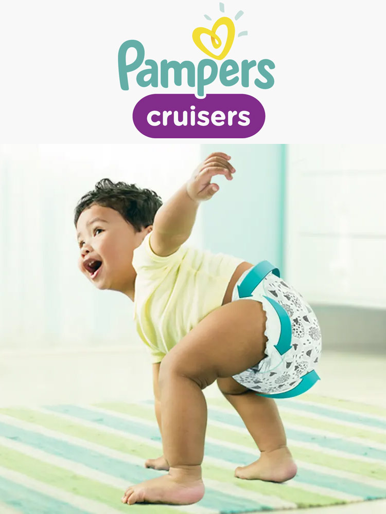baby wearing a pampers cruisers diaper