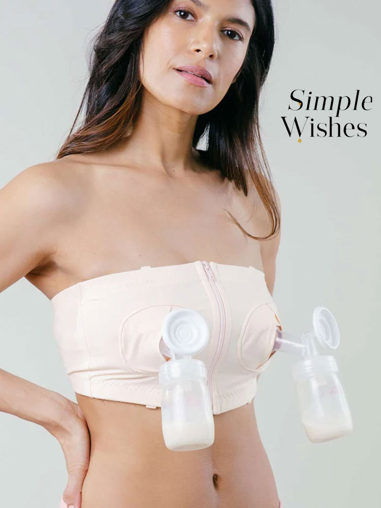 woman pumping breasts through the simple wishes nursing bra