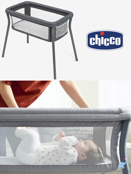 baby laying down inside the chicco lullago bassinet side view through mesh