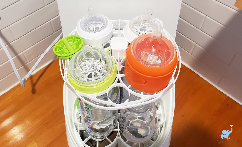 baby brezza bottle washer pro top rack filled with bottle nipples
