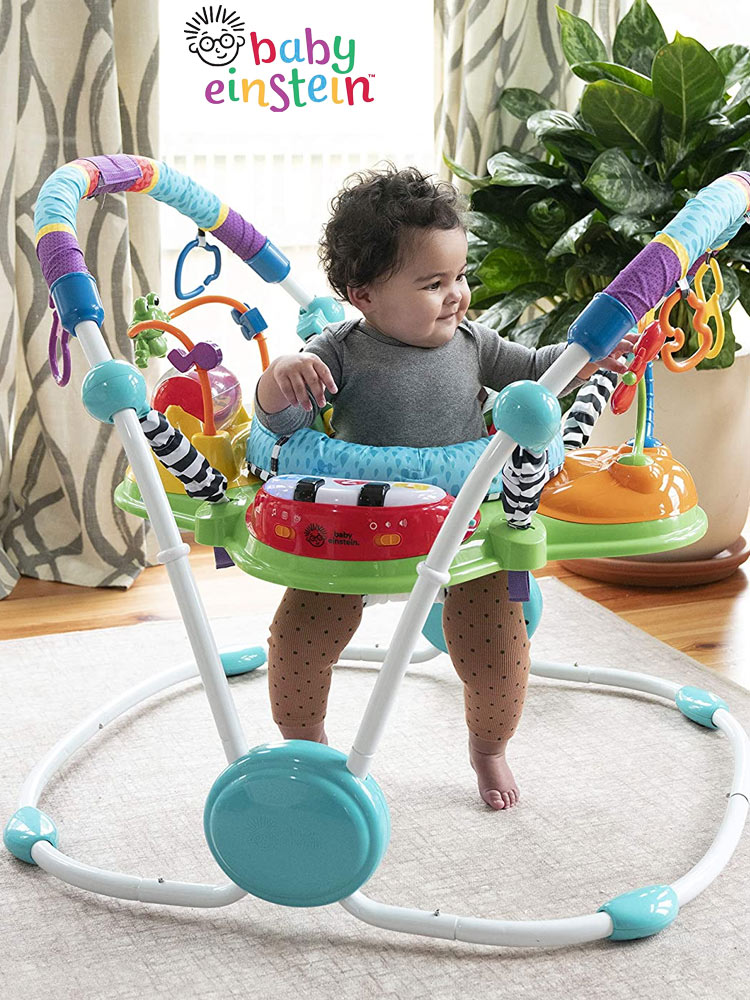 a baby playing in the baby einstein activity jumper