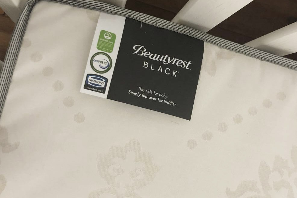the label of the beautyrest black crib mattress