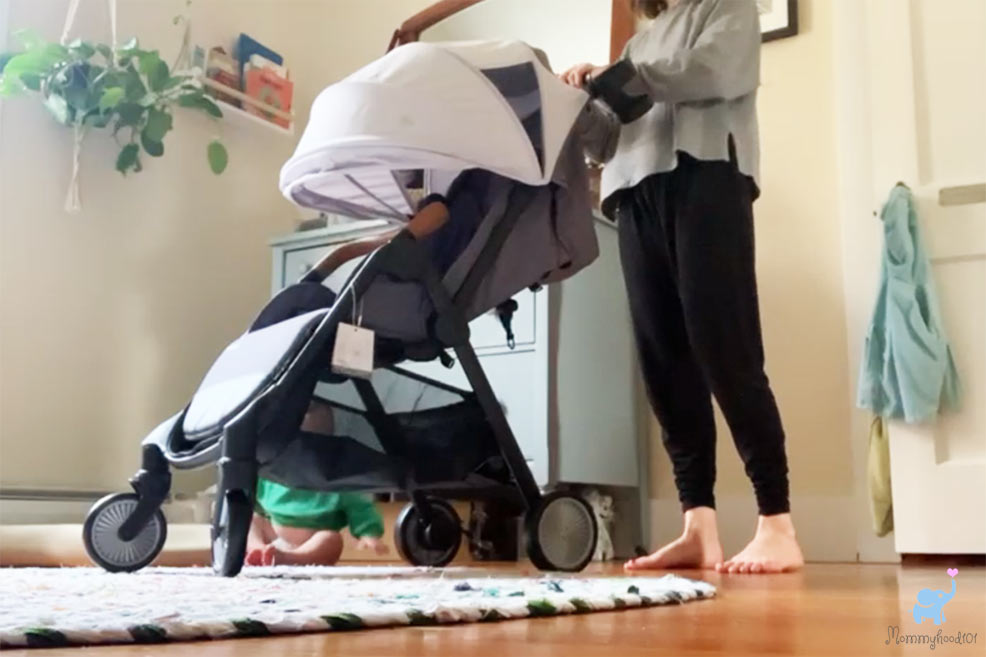 woman pushing besrey lightweight stroller