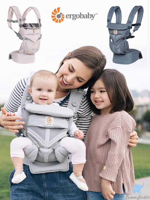 woman wearing ergobaby omni 360 baby carrier with baby and older child
