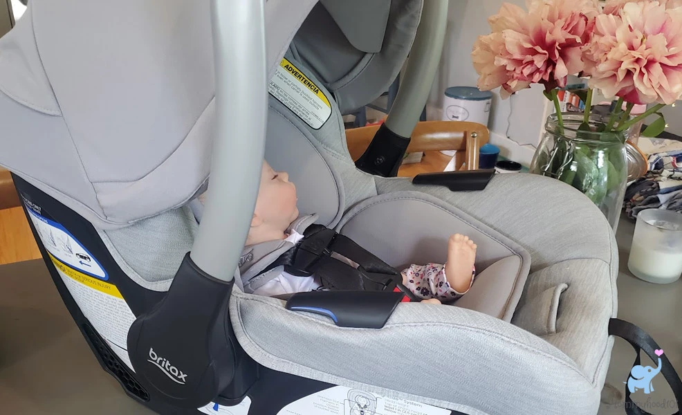baby sitting in the britax cypress infant car seat