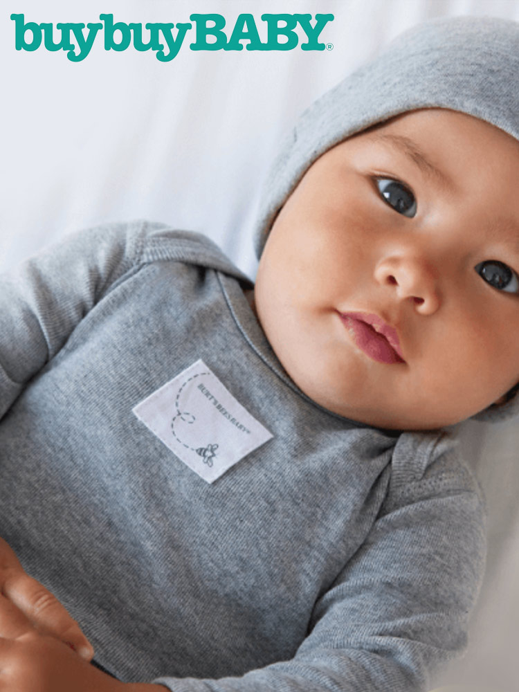 a baby laying down and the buybuybaby baby registry logo