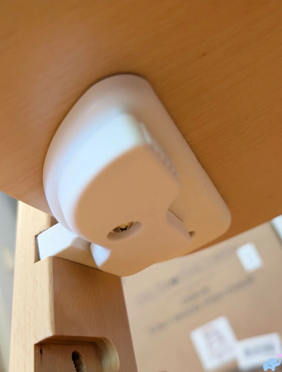 Locking mechanism used to reposition the Delta Children Crave High Chair seat and footrest