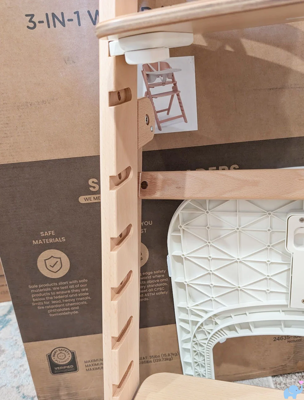 Multiple seat and footrest adjustment slots on the Delta Children Crave High Chair frame
