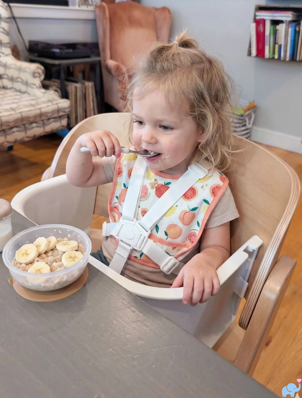Two-year-old child eating at the dining table in the Delta Children Crave toddler configuration