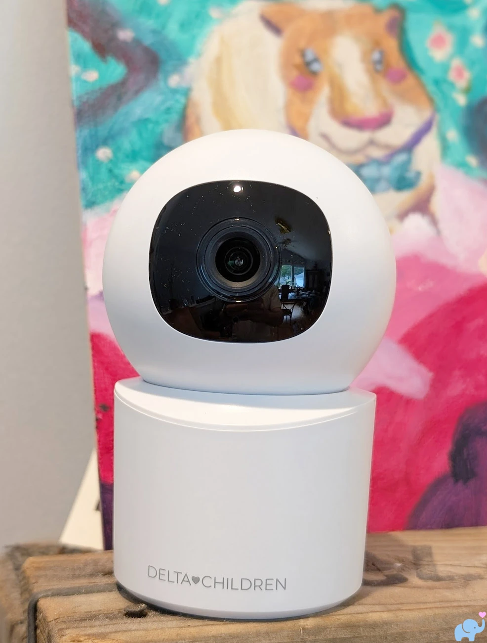 Delta Children Smart Sleep camera standing on a nursery shelf