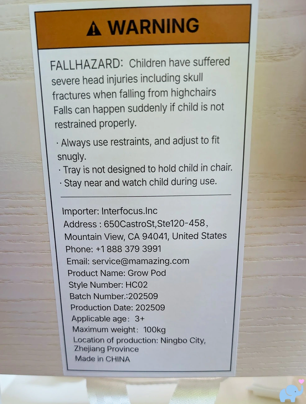 Mamazing GrowPod rear seat label showing model information safety warnings and weight limits
