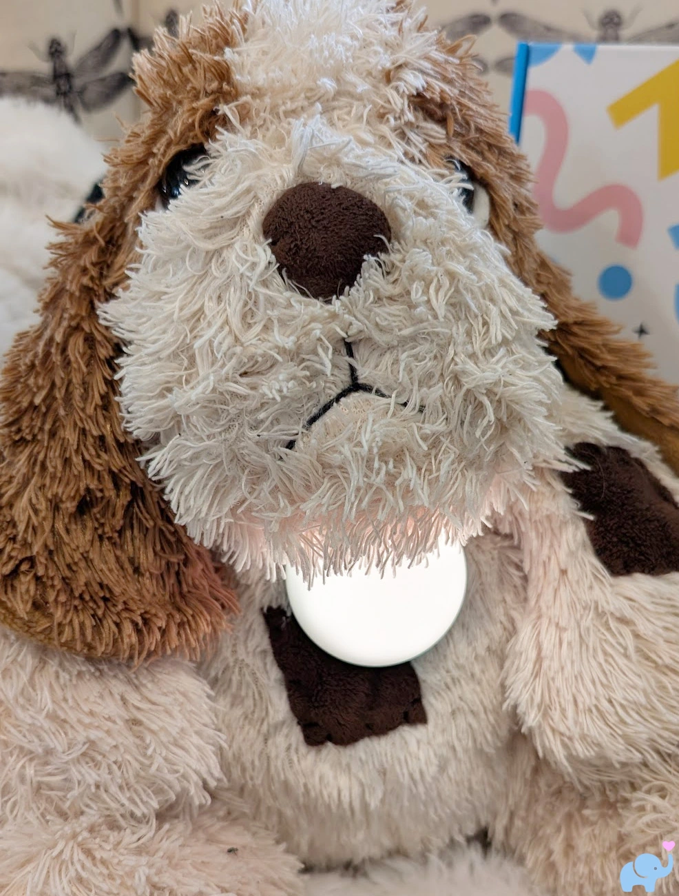 haivivi bubblepal attached to a child's favorite stuffed dog using the adjustable lanyard