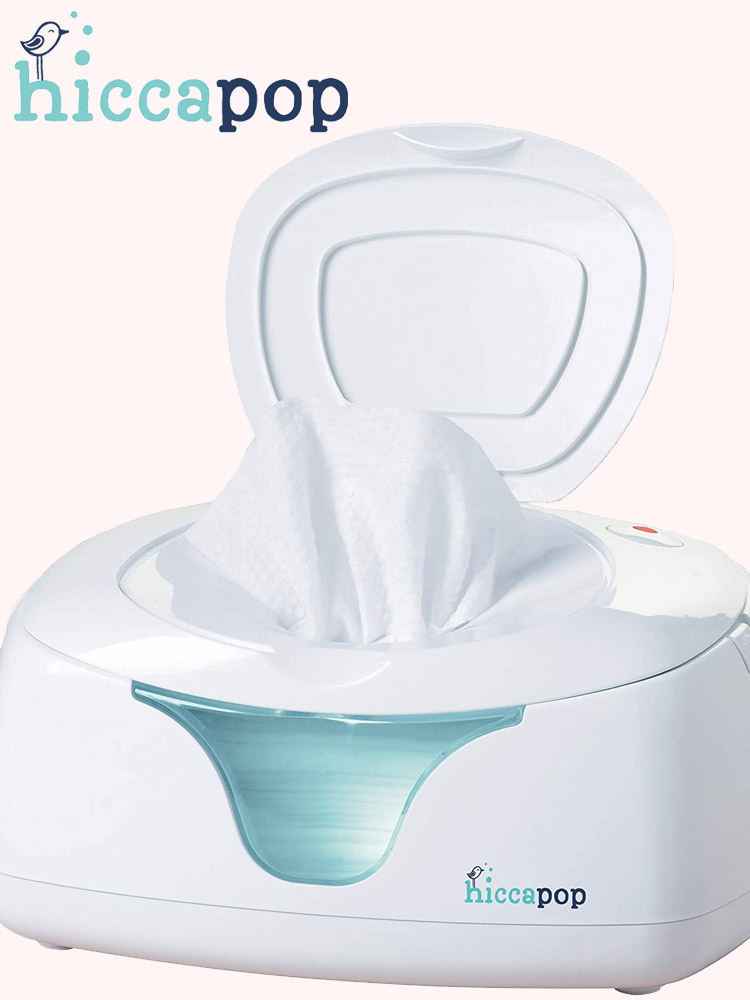 the hiccapop ultra wipe warmer with top open and a wipe being dispensed