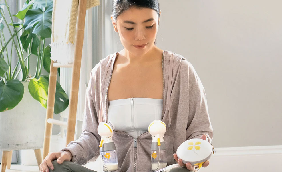 mom with medela breast pump