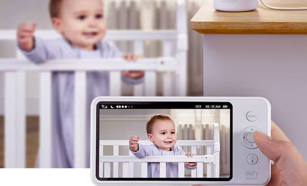 the eufy spaceview baby monitor with a view of a baby in a crib