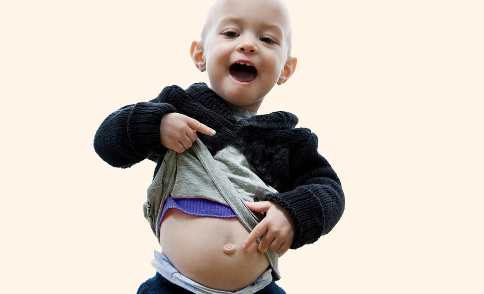 toddler pointing at his tummy
