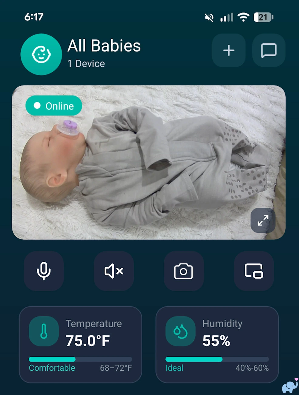 Jartoo smartphone app showing a live daytime baby monitor feed with temperature and humidity