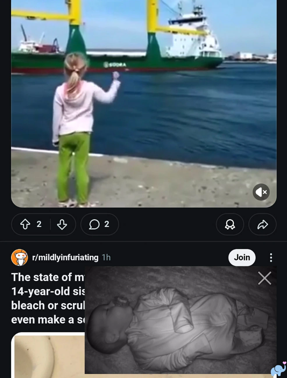 Jartoo baby monitor video displayed as a floating picture-in-picture overlay above other smartphone content