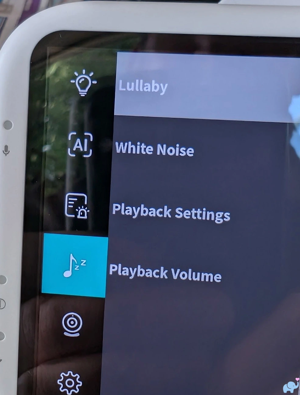 Jartoo JBM550 parent-unit menu showing lullabies white noise nature sounds and playback settings
