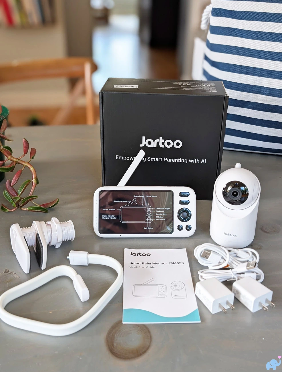 All Jartoo JBM550 baby monitor components unpacked on a table