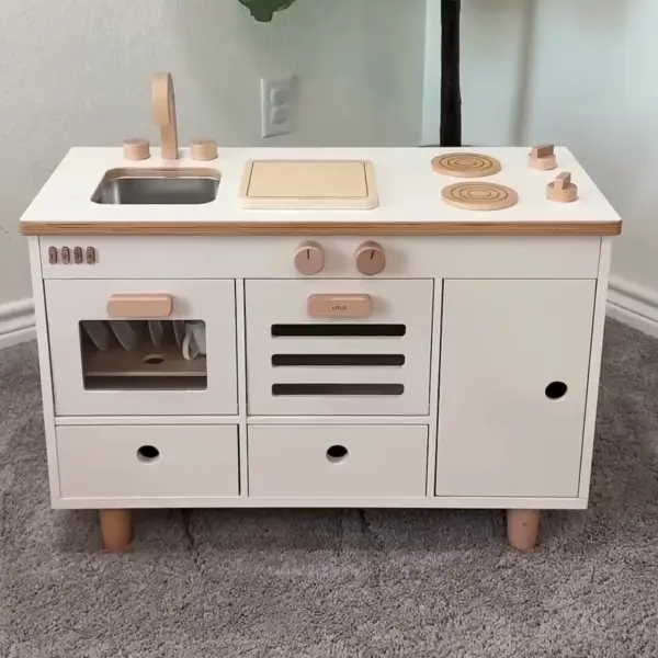 kid playing with the lalo play kitchen