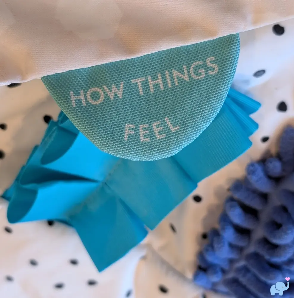 Exploring Textures sensory panel on the Lovevery Play Gym