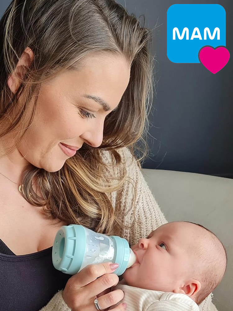 mom feeding baby with a mam baby bottle