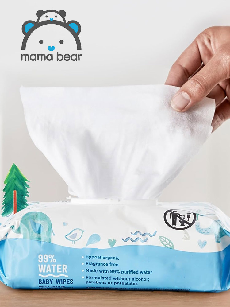 a hand pulling a wipe from a pack of amazon mama bear water baby wipes