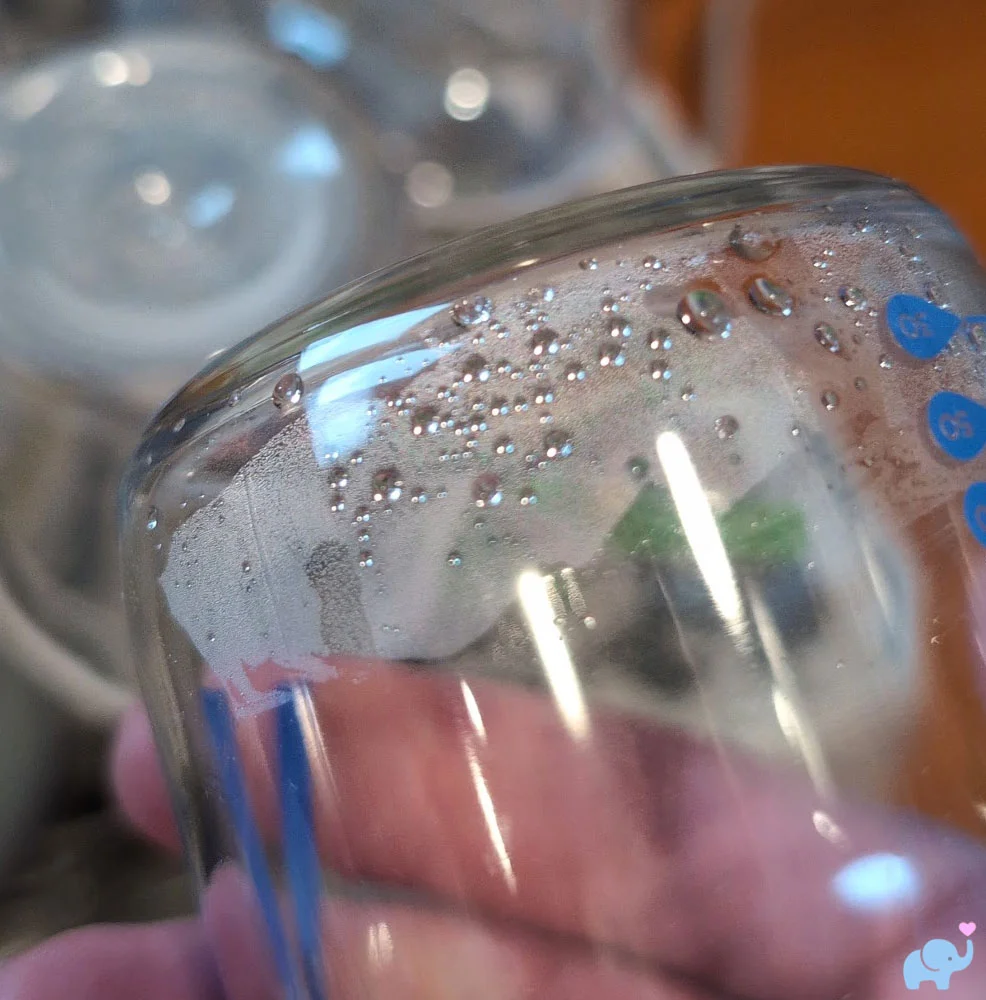 Remaining condensation inside a Dr. Brown's glass bottle after drying in the Momcozy DeepClean Baby Bottle Washer D8