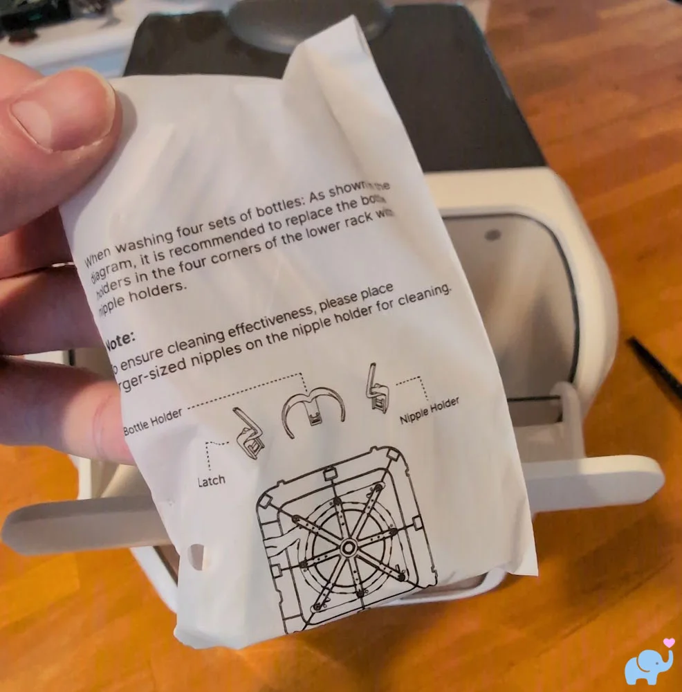 Extra nipple holder accessories included with the Momcozy DeepClean Baby Bottle Washer D8