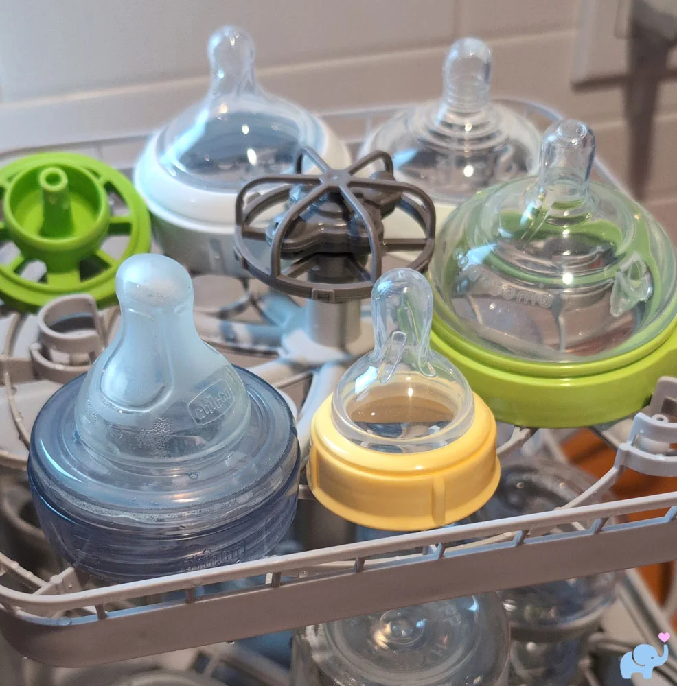 Clean and dry bottle nipples on the top rack of the Momcozy DeepClean Baby Bottle Washer D8