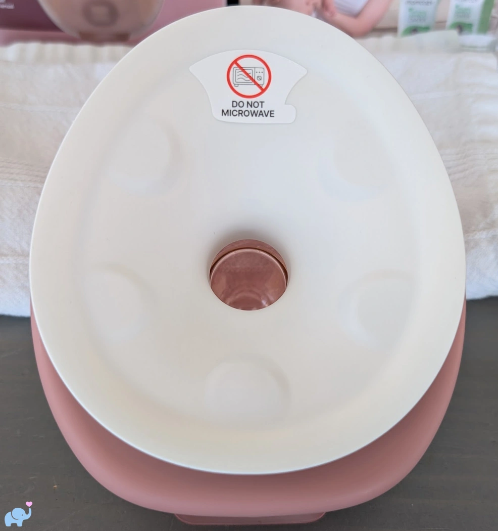 close up of the soft breast shield on the Momcozy Wellness 1 warm massage wearable breast pump