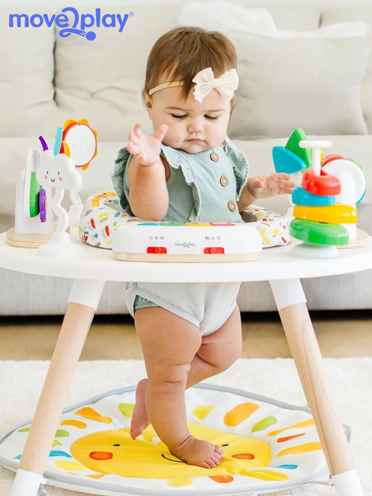 a baby playing in the move2play activity center