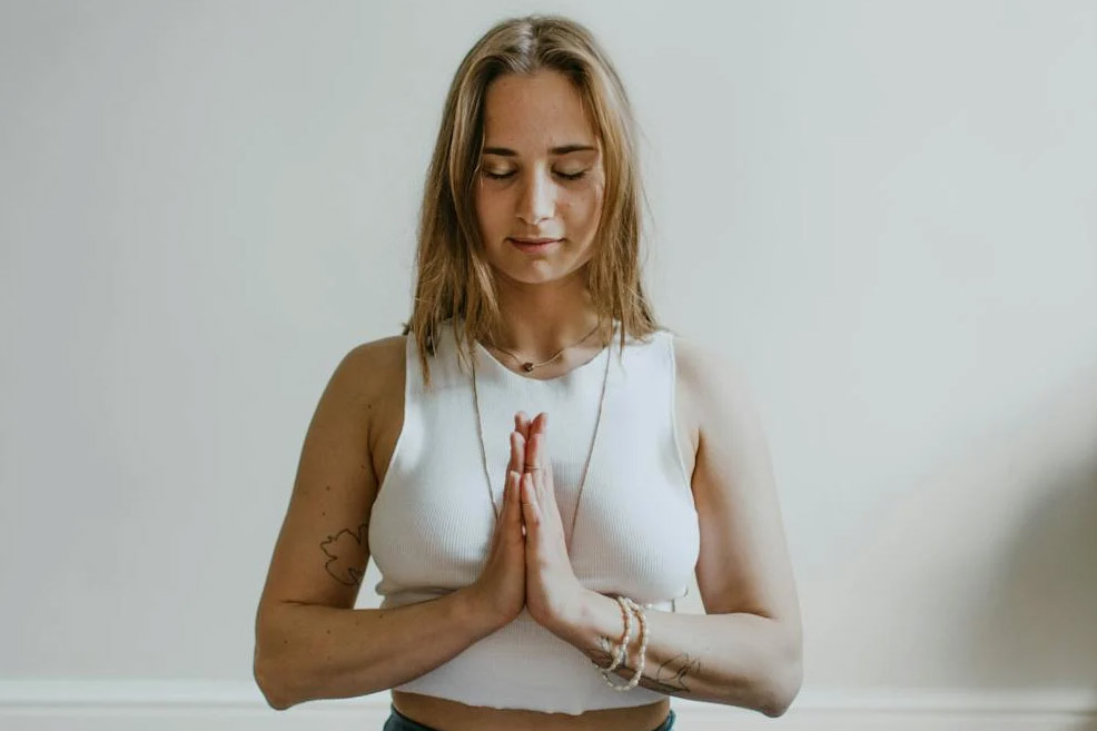 new mom doing yoga to relax