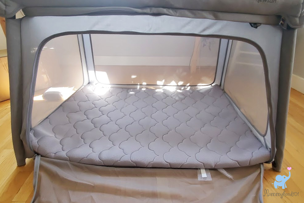 the newton travel crib fully opened and set up