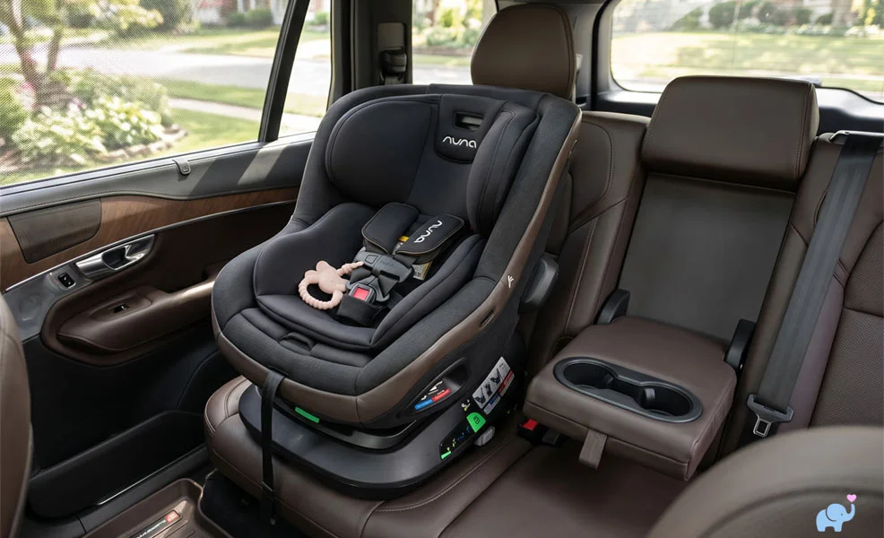 nuna revv maxx convertible car seat installed in a BMW in front facing position