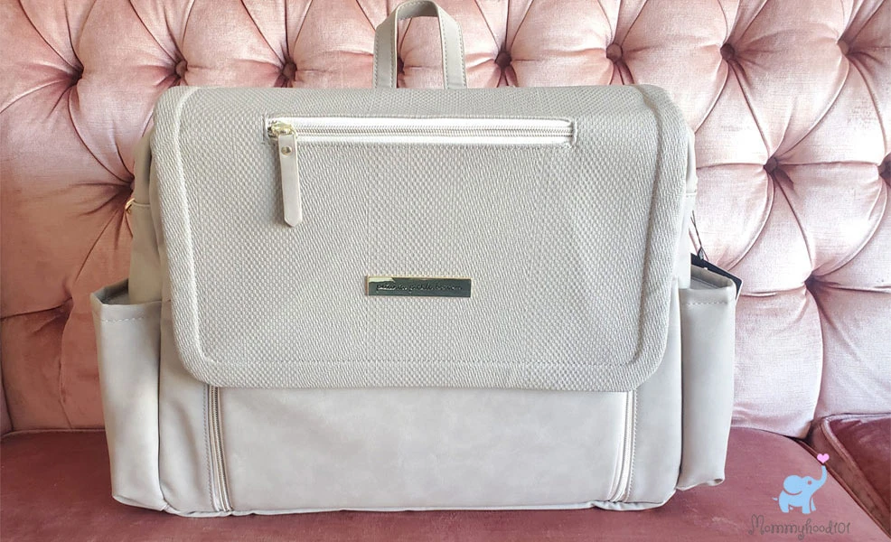 petunia pickle bottom boxy deluxe diaper bag on couch for review and testing