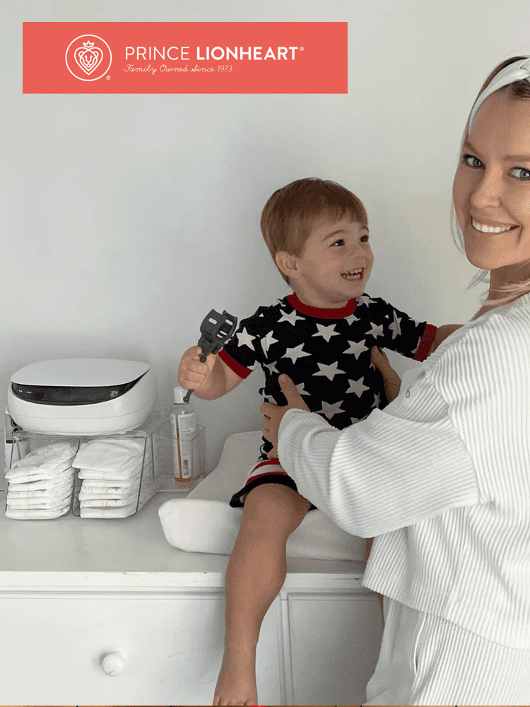 mom and child with the prince lionheart evo baby wipe warmer 