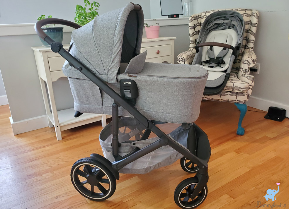 romer sera bassinet on the tura stroller outward facing