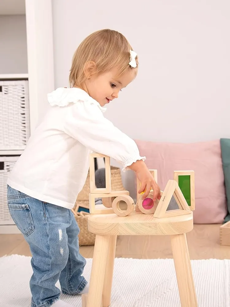 TickiT sensory building blocks with beads, liquids, and colored inserts