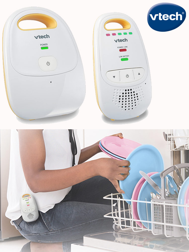 a parent loading the dishwasher while listening to their baby with the vtech dm111 baby monitor