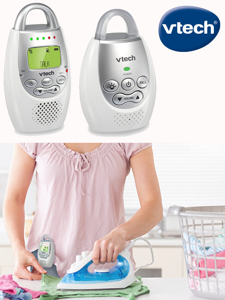a parent ironing clothes while listening to their baby with the vtech dm331 baby monitor